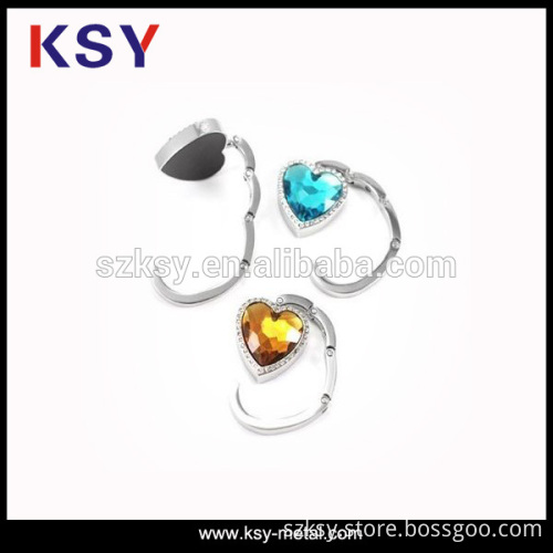 Widely used purse holder for table
